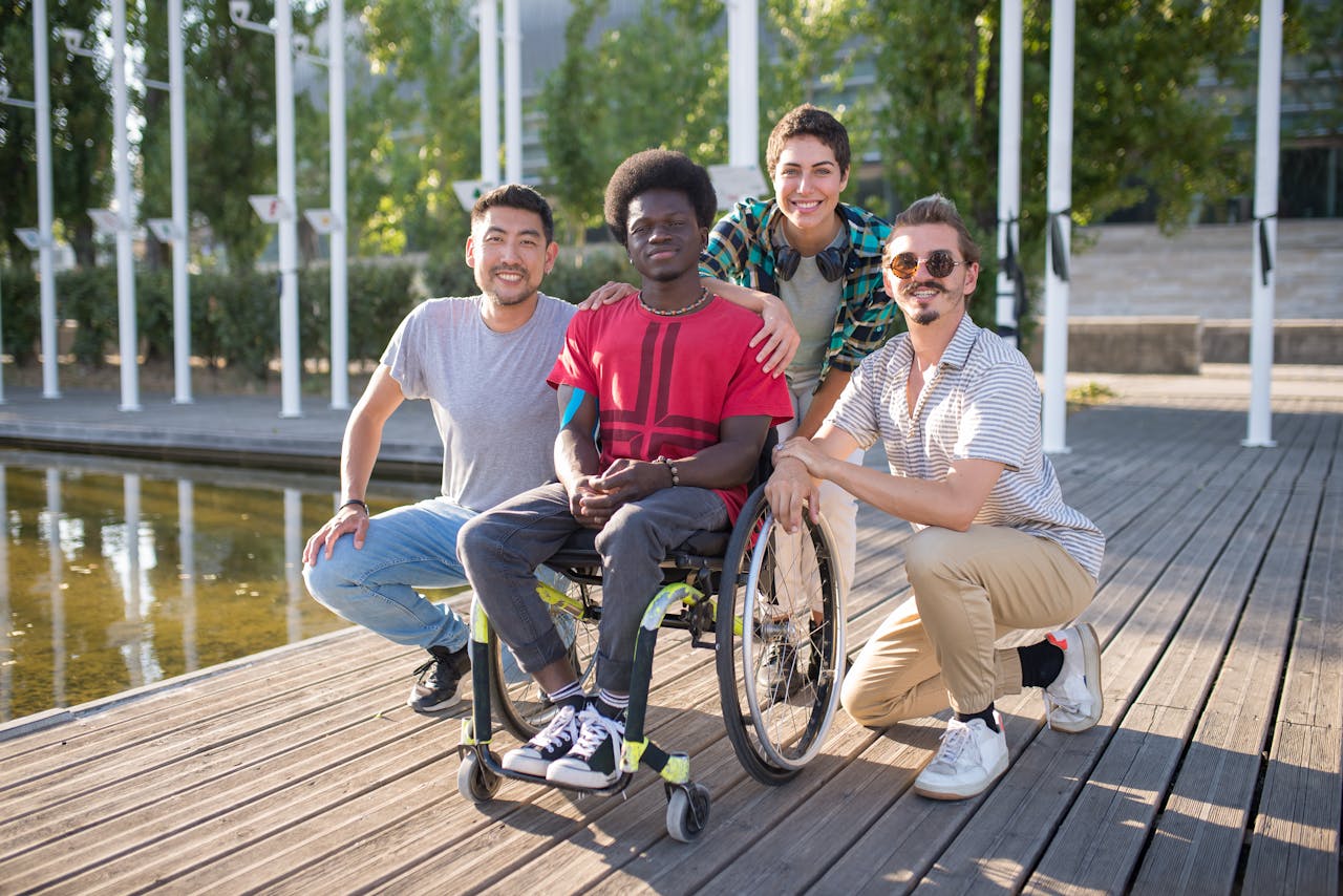 Crafting Captivating Headlines: Your awesome post title goes here Group of diverse friends, including a person in a wheelchair, enjoying a sunny day at the park.